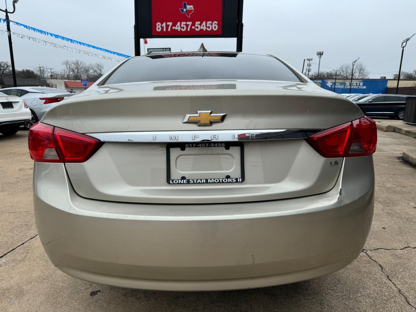 2015 GOLD /Gray CHEVROLET IMPALA LS Fleet 4dr Sedan (2G11X5SL7F9) with an 2.5L I4 engine, Automatic 6-Speed transmission, located at 5900 E. Lancaster Ave., Fort Worth, TX, 76112, (817) 457-5456, 0.000000, 0.000000 - This is a 2015 Chevrolet Impala LS Fleet 4dr Sedan that is in excellent condition. There are no dents or scratches. The interior is clean with no rips or tears or stains. All power windows, door locks and seats. Ice cold AC for those hot Texas summer days. It is equipped with a CD player, AM/FM radi - Photo#4